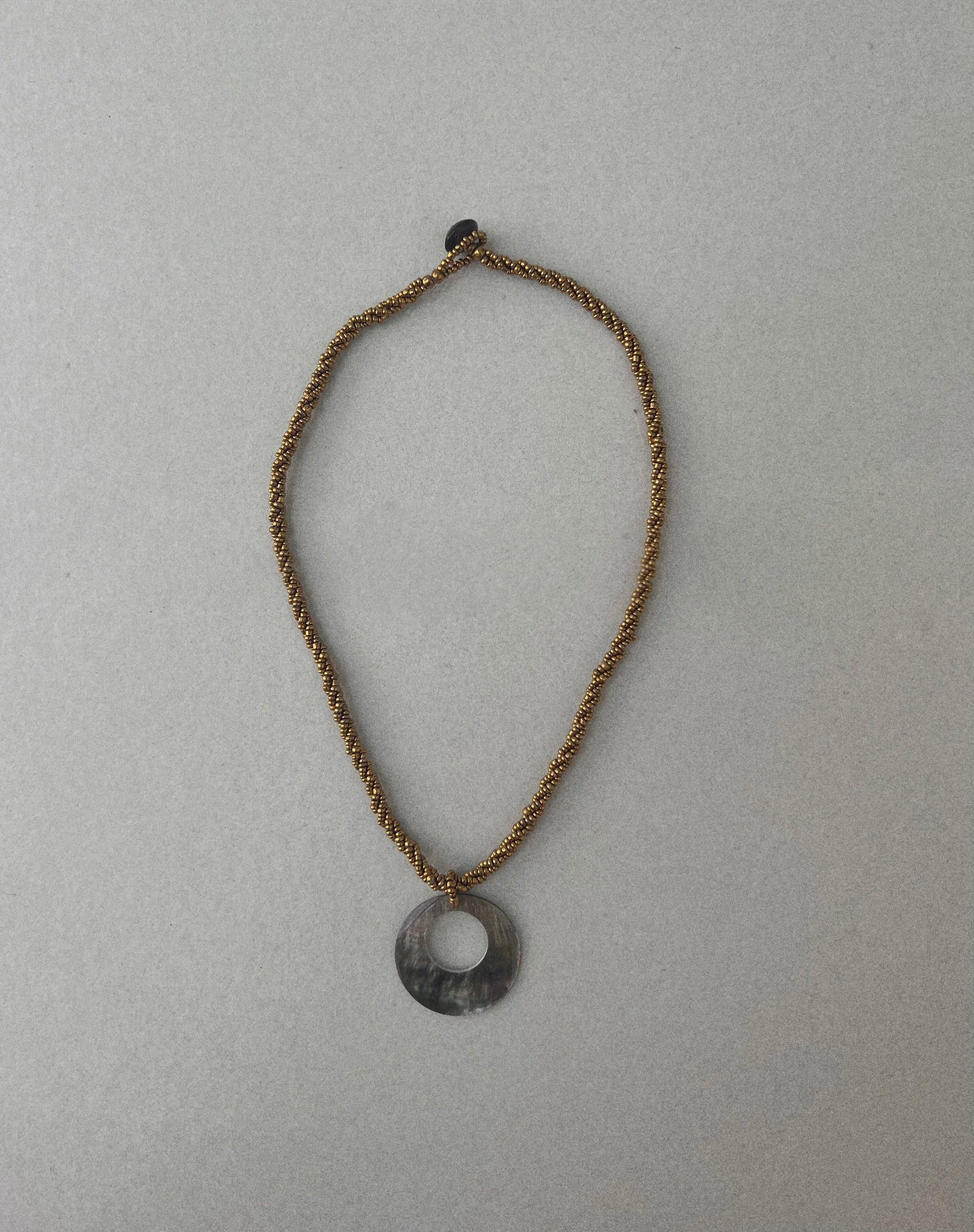 Arma Necklace with Round Shell Pendant in Gold