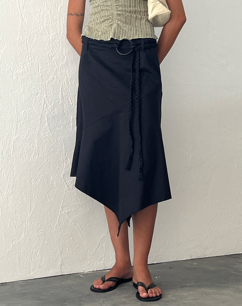 Nejusi Asymmetric Midi Skirt in Black with Braided Belt